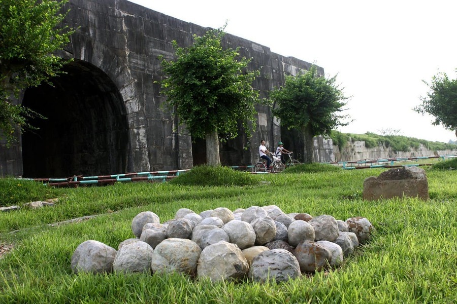 Ho Citadel, Vietnam World Heritage Site: stone fortress, mountains.
